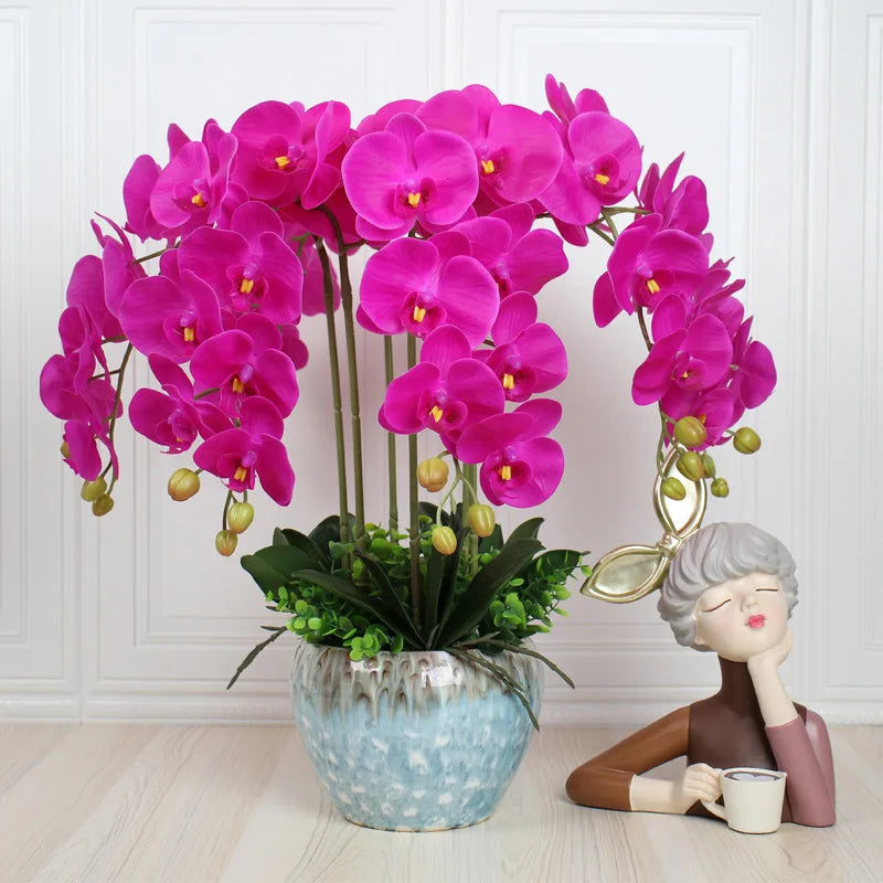 décoration intérieure orchidées artificielles blanc rose jaune feuilles vertes minimaliste mariage anniversaire baby shower