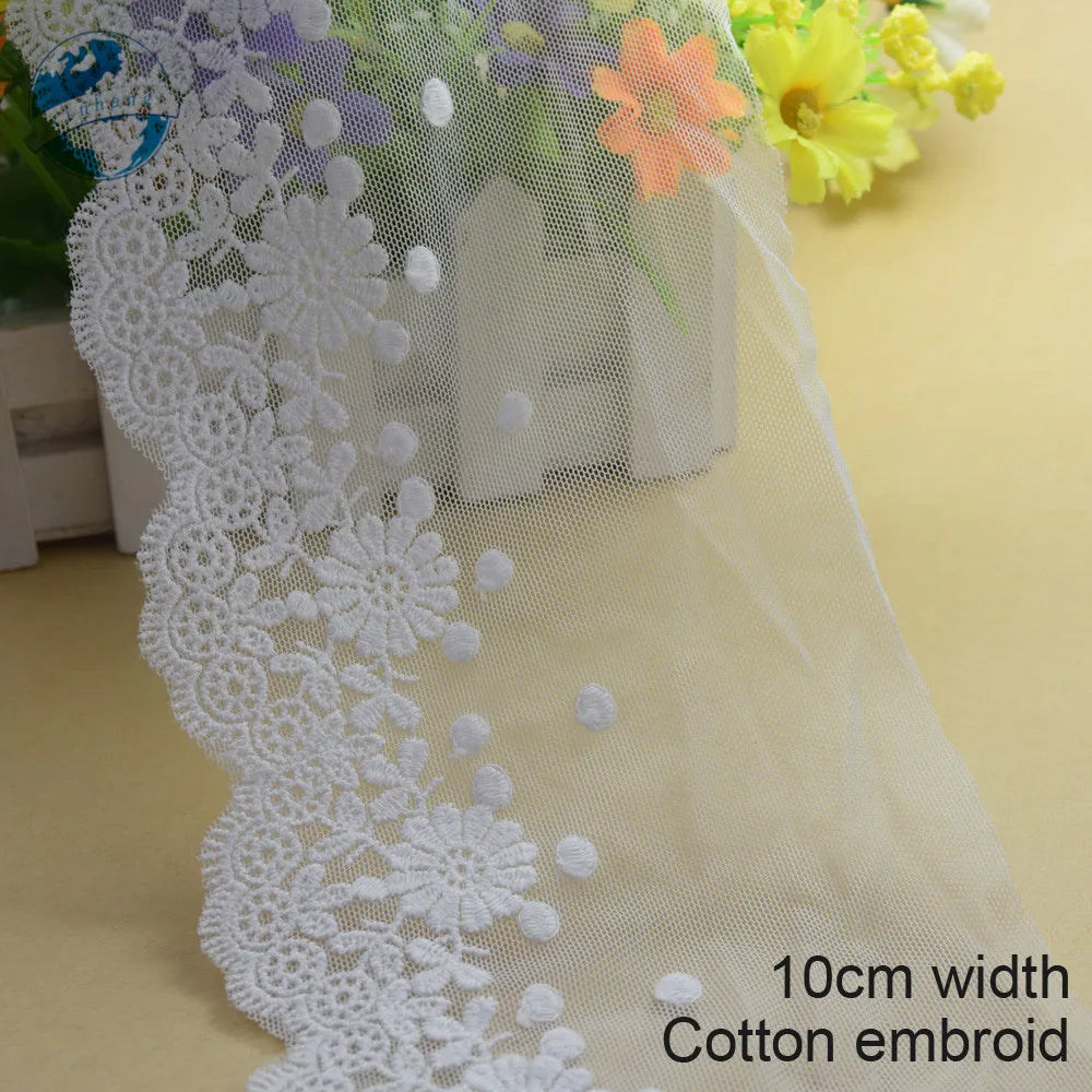 dentelle brodée blanc motifs floraux ajourés 10cm large translucide coton nylon couture