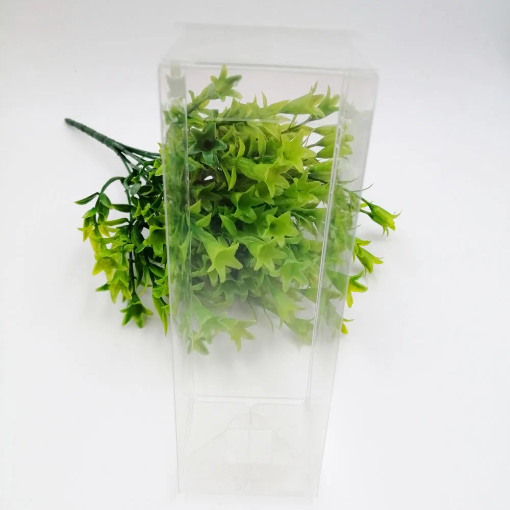 Boîte transparente ouverte montrant l'intérieur pour rangement