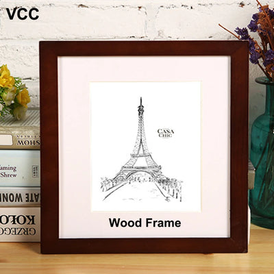 Cadre photo carré en bois blanc avec plexiglas écologique sur fond mural neutre