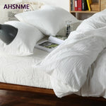 housse couette coton blanc taies oreillers ensemble literie texture minimaliste chambre