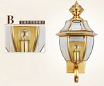 lampe murale classique dorée transparente motifs géométriques ampoule chambre coucher