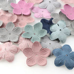 Fleurs roses en cuir pour décoration maison