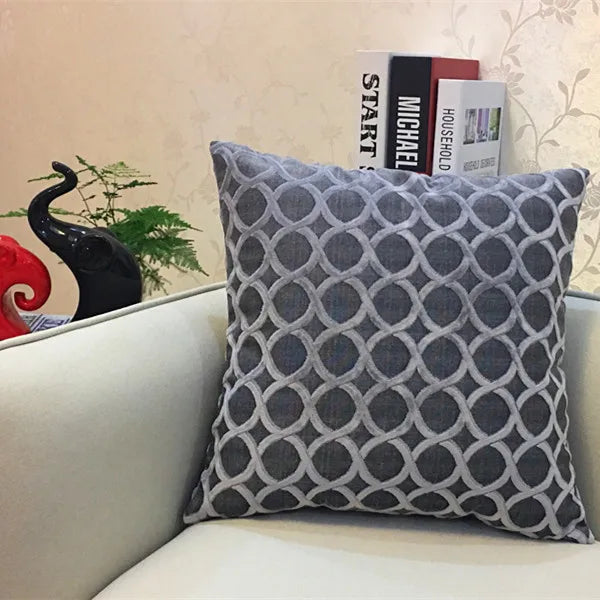 coussin carré velours motif cercles entrelacés rouge jaune vert bleu violet gris contemporain fixations