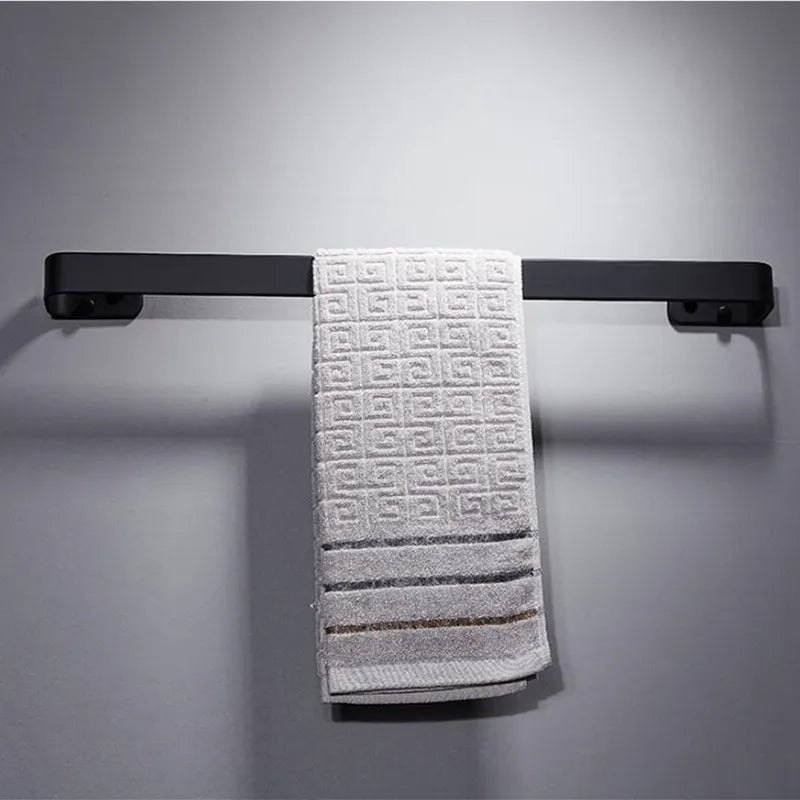 porte serviettes mural moderne vis fixe serviette blanche motifs géométriques rayures noires aluminium noir