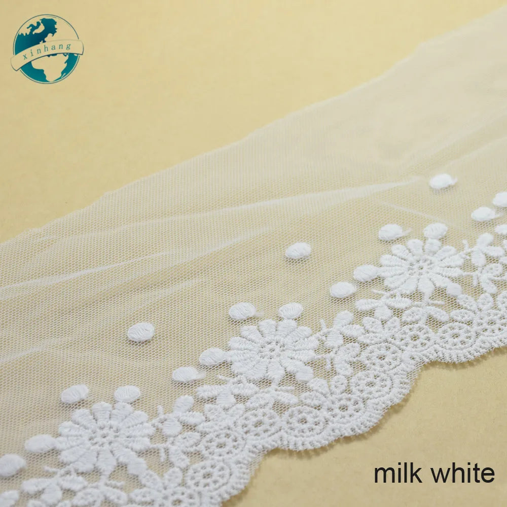 dentelle brodée blanc motifs floraux ajourés 10cm large translucide coton nylon couture