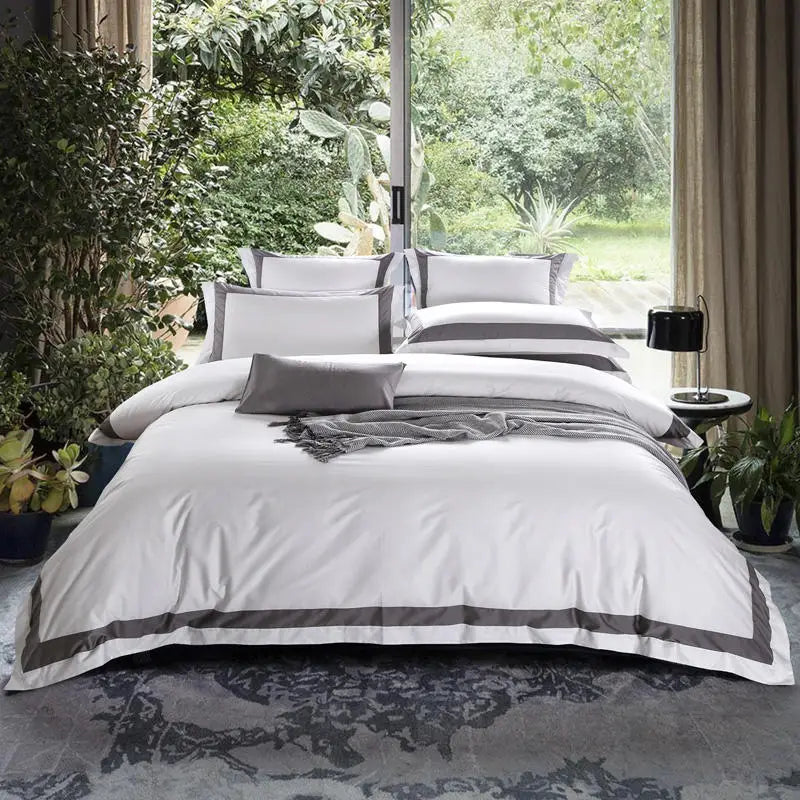 Ensemble literie blanc avec housse de couette et taies d'oreiller