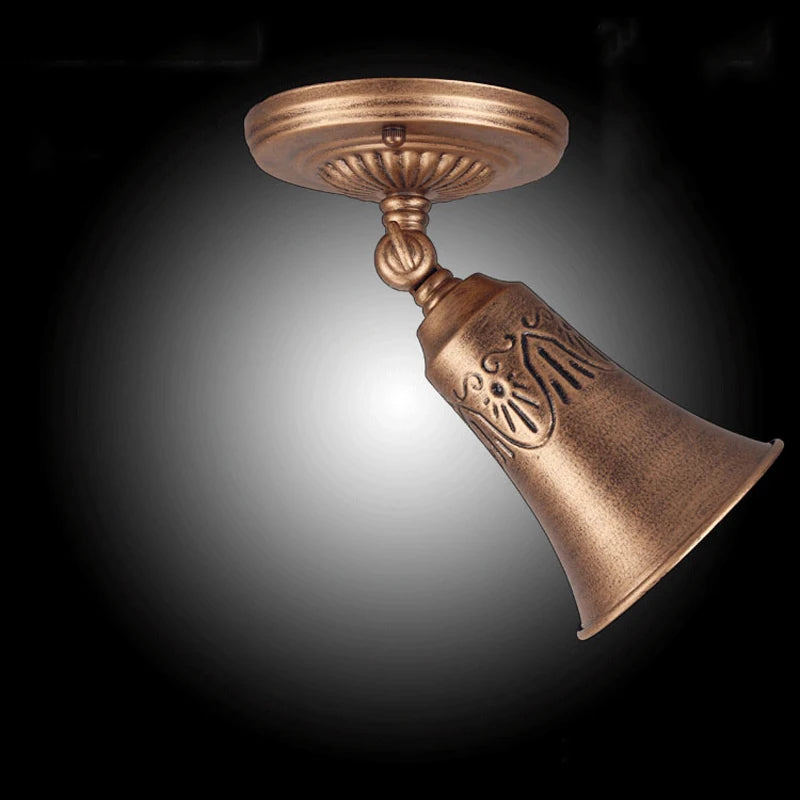 Spot bronze led éclairage industriel vintage texture métallique gravure fixations vis