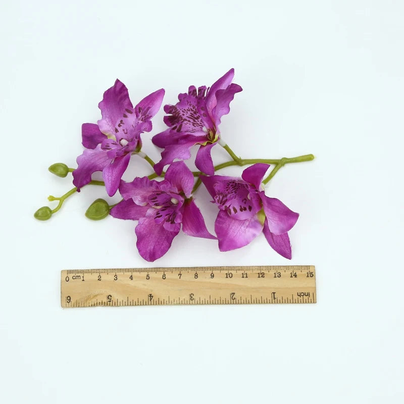Décoration extérieure mariage bouquet orchidée papillon violet rouge jaune blanc multicolore