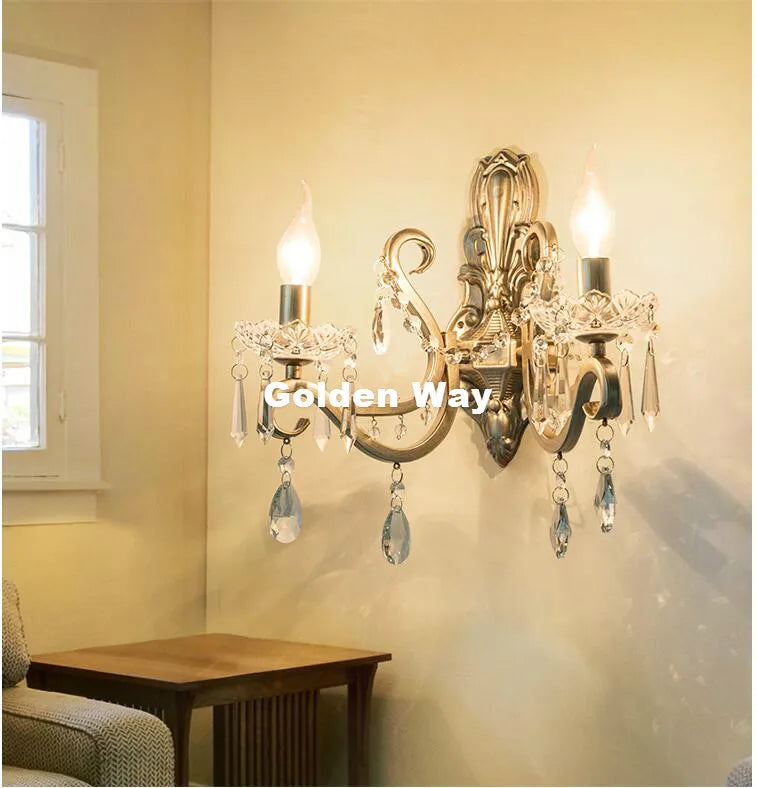 Applique murale ornements baroques cristal transparents doré deux ampoules quatre pendants