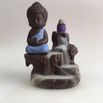 statue bouddha artisanale statuaire motifs roche texture granuleuse apaisante calme salon