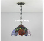 lampe suspendue tiffany multicolore fleurs géométriques opacité chaîne métal salon chambre étude