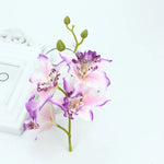 Décoration extérieure mariage bouquet orchidée papillon violet rouge jaune blanc multicolore
