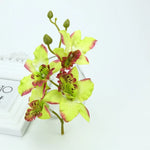 Décoration extérieure mariage bouquet orchidée papillon violet rouge jaune blanc multicolore