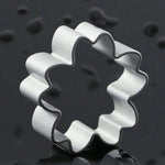outils biscuits argentés forme cœur triangle moderne aluminium