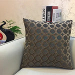 coussin carré velours motif cercles entrelacés rouge jaune vert bleu violet gris contemporain fixations