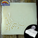 savon artisanal blanc motifs floraux gravés texture granuleuse traditionnel sans anse utilisation