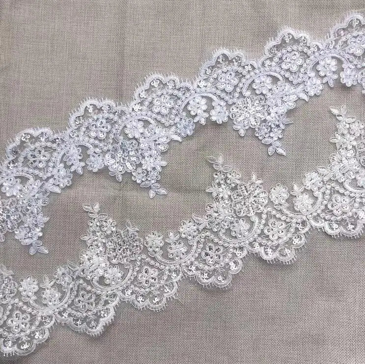 ruban dentelle polyester blanc motifs fleurs ajourés classique romantique festif largeur 13cm opaque erotique