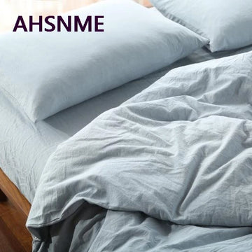 linge lit 100 coton drap plat gris clair texture minimaliste simple tricot horloge lampe