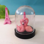 ornements transparents noir rose tour eiffel figurines branches dorées cloches bases circulaires décoration mariage