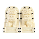 statues lions chinois or blanc crème sculptées détaillées traditionnel asiatique résistant extérieur