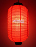 lanternes suspendues traditionnelles rayées opaques blanc rouge passe câble noir restaurant spa decoration
