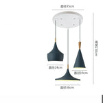 lampes suspendues modernes trois abatjours vert jaune rose blanc minimaliste