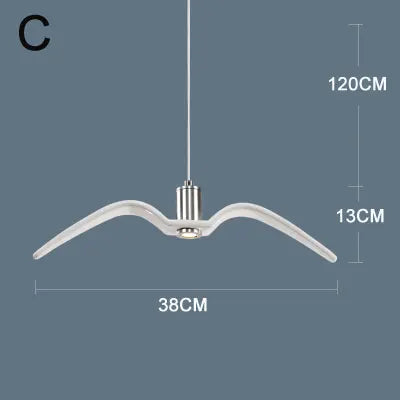 suspension lumineuse moderne oiseau stylisé noir blanc câbles opacité chambre salon