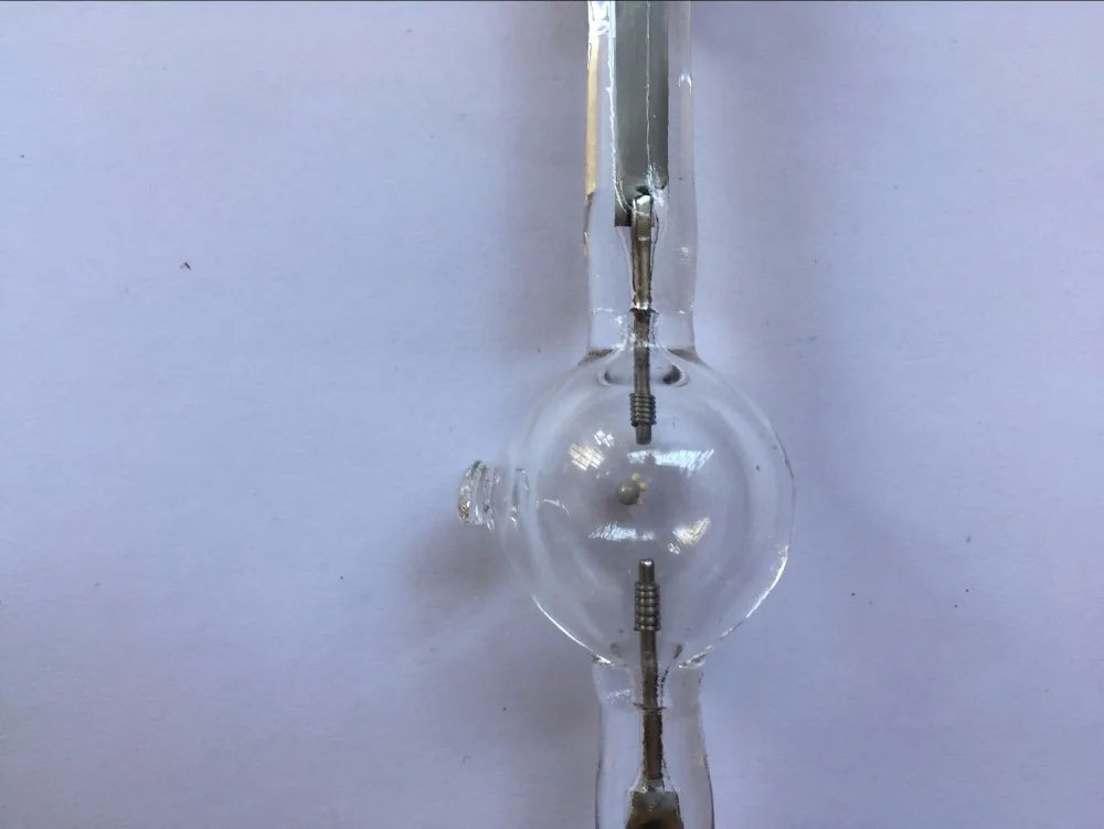 lampe halogène métallique 575w projecteur industrielle technique transparent argente rougescrição