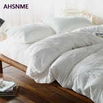 housse couette coton blanc taies oreillers ensemble literie texture minimaliste chambre