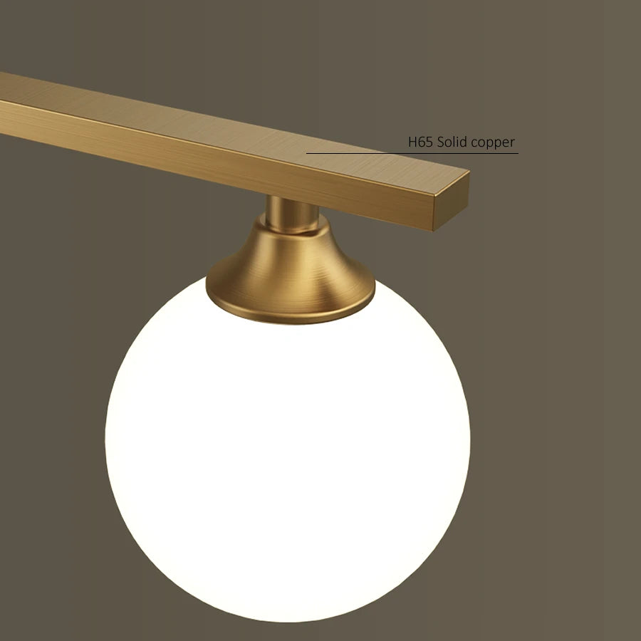 suspension lumineuse or blanc sphères translucides barre horizontale moderne minimaliste chambre salon