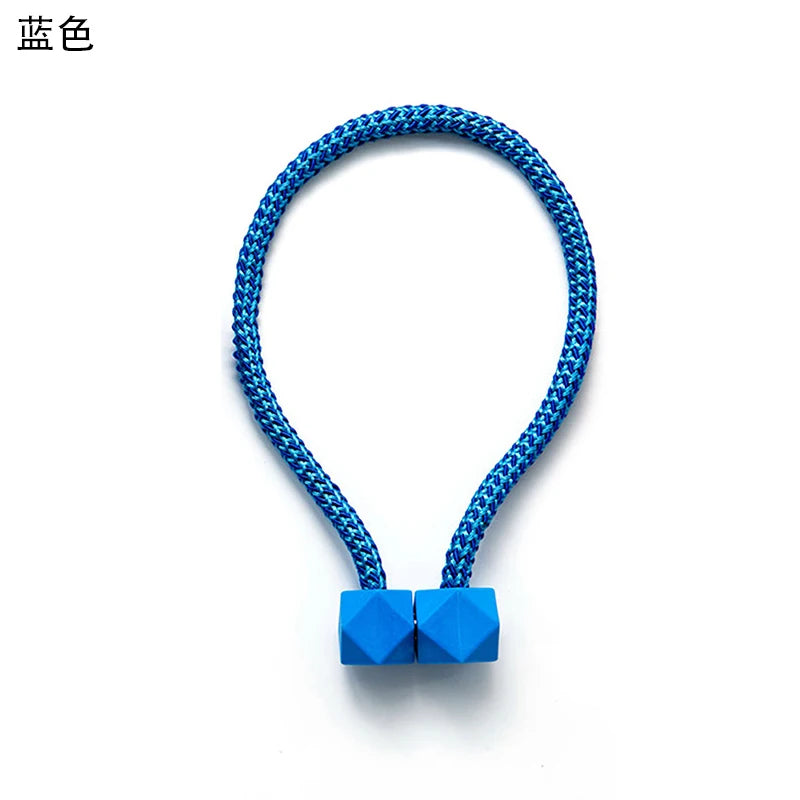 attaches rideaux décoratives modernes couleurs vives tressure cordée forme cube prismatique fixations nodales