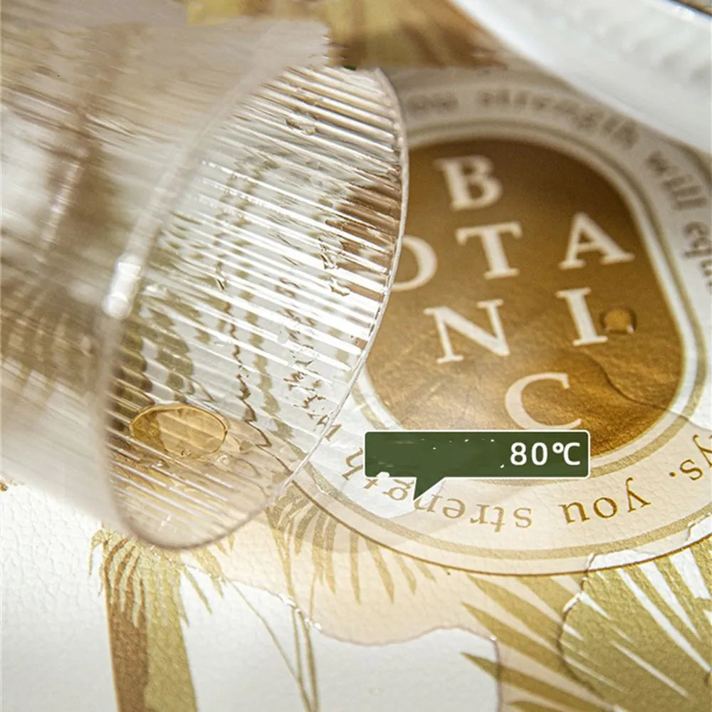 placemat rond vert blanc doré palmiers singes botanics assiette fourchette pain verre vin livre