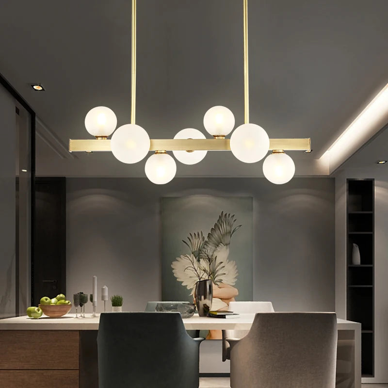 suspension lumineuse moderne or blanc boules translucides chaines interrupteur tactile