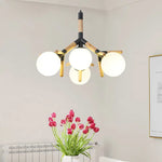 lampe suspendue moderne blanc bois sphères opaques scandinave chaines métallique