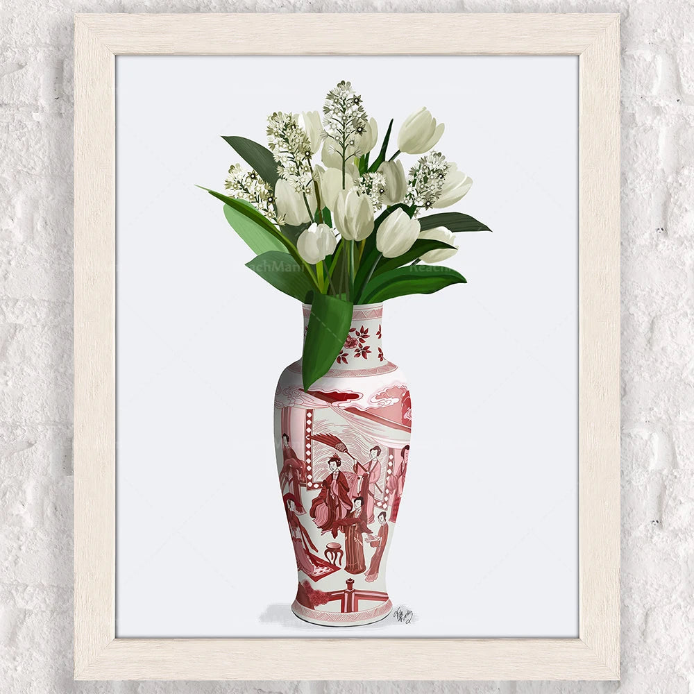 Un magnifique bouquet de tulipes blanches et de fleurs printanières dans un vase décoré de motifs rouges et blancs.