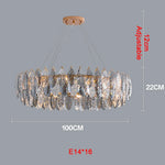 chandelier moderne luxueux transparent feuilles stylisées câbles métalliques doré argenté