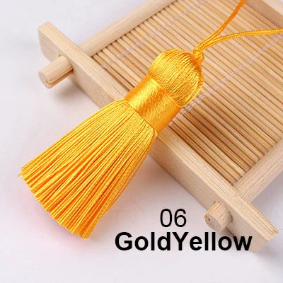 pompons soie polyester 5cm longueur 18cm corde noir rose rouge vert jaune bleu modernes