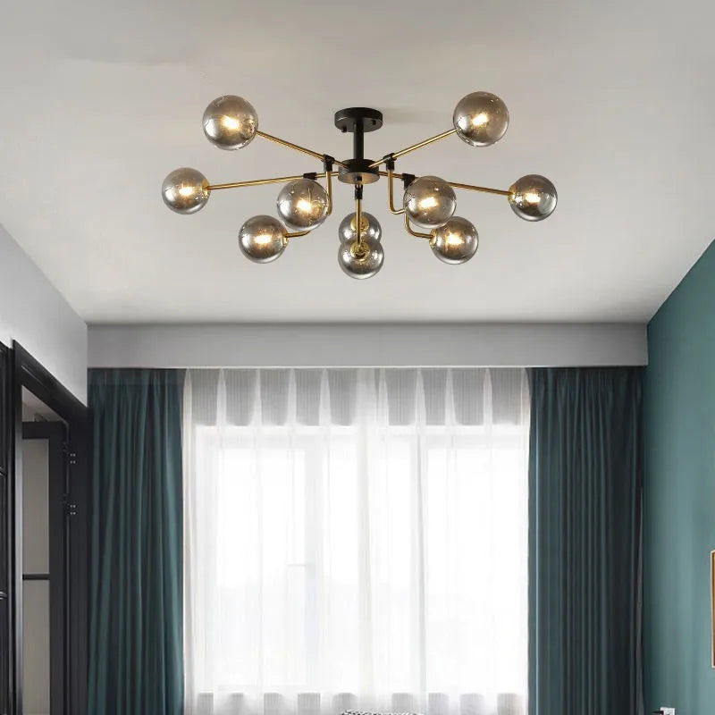 lampe suspension moderne sphères translucides structure dorée salon blanc nordique