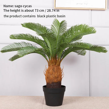plante artificielle moderne feuilles vertes tronc texturé pot noir décoration intérieure feuilles fines branche