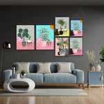 Le mur décoré de tableaux colorés avec des plantes et des motifs géométriques crée un décor moderne et vivant dans ce salon.