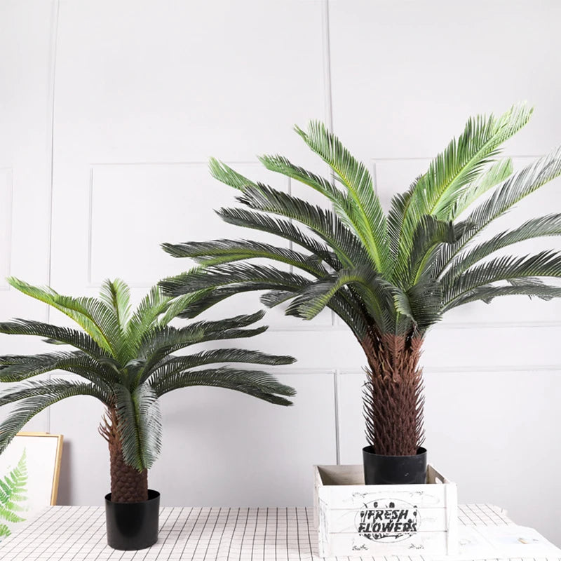 plante artificielle moderne feuilles vertes tronc texturé pot noir décoration intérieure feuilles fines branche