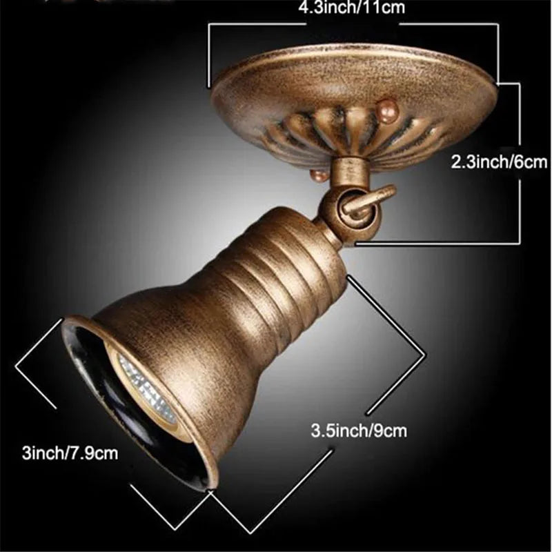 Spot bronze led éclairage industriel vintage texture métallique gravure fixations vis