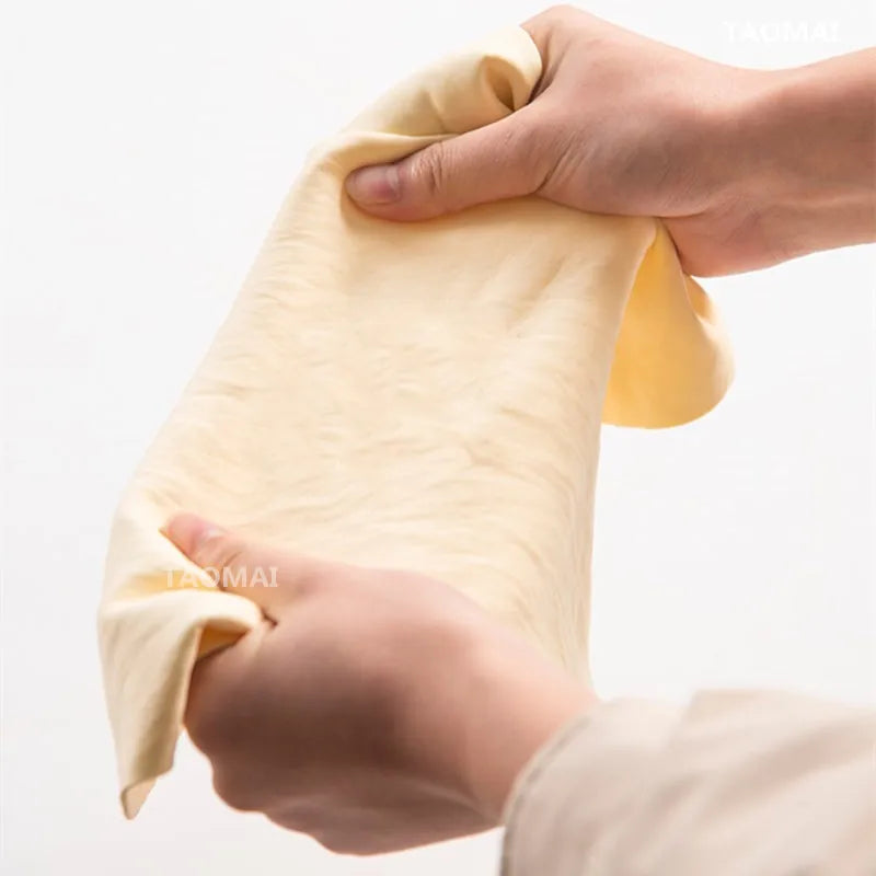serviette papier beige clair texture légèrement rugueuse simple utilitaire diamètre 32cm