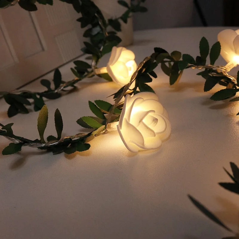 guirlande lumineuse fleurs blanches feuilles vertes clips romantique noël décoration chambre partie