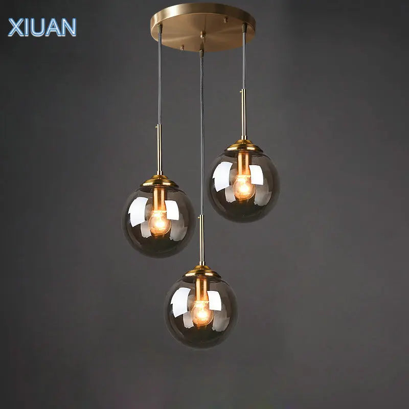 Lampe suspendue en verre gris fumé ambre