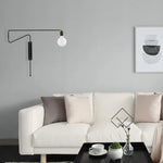 lampe murale articulée bras long noir doré moderne éclairage chambre minimaliste industrielle