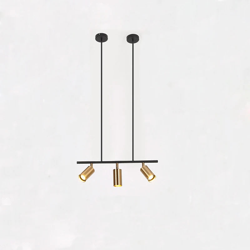 suspension lumineuse moderne noir doré tête brillante métal poli minimaliste