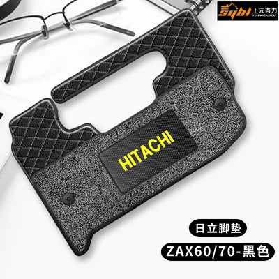 tapis sol rouge noir quilté moderne hitachi logo cabine véhicule