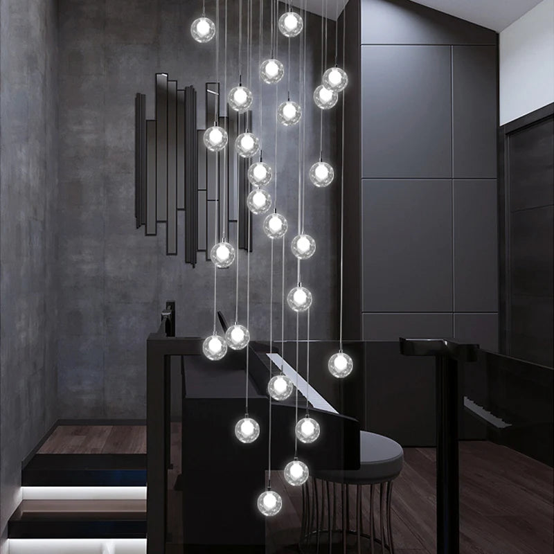 suspension lumineuse moderne verre transparent sphères simples éclairage led contemporain fixations invisibles